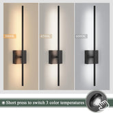 Three wall-mounted lights with different color temperature labels on a gray background